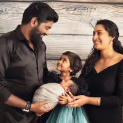 A new baby brings a new dimension of love to a family. I love capturing these early connections, with parents and siblings gazing at the newest member. This is a complete family portrait, a memory for everyone to cherish.