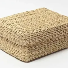 A rectangular, lidded storage box woven from natural fibers. This versatile box is perfect for organizing small items, storing keepsakes, or as an eco-friendly gift box.