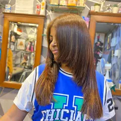 A side profile showing the soft and natural-looking highlights. This colouring technique is low maintenance and grows out beautifully.