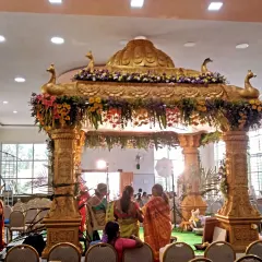 Another view of the peacock mandap, showing how it commands the space within the wedding hall, ready for the ceremony.