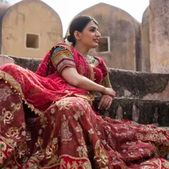 A closer look at the incredible craftsmanship of this designer bridal lehenga. The detail in the embroidery is simply breathtaking.