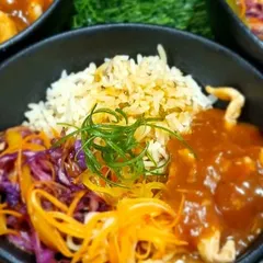 A hearty and delicious Chicken Donburi bowl. This Japanese-inspired dish with rice, chicken, and fresh vegetables is a great option for a more substantial meal at a party.
