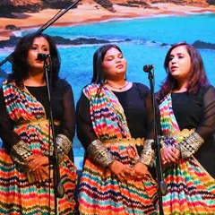 A close-up of our adult students performing at the 'Sakhya' showcase. Their expressions show the deep connection and emotion they pour into their music.