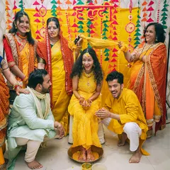 The whole family gets in on the fun during the haldi ceremony. It's all about capturing the collective joy and blessings.