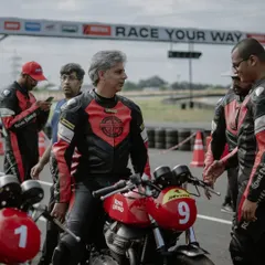 A group of riders getting ready for their session. The camaraderie and shared excitement before hitting the track is a huge part of the experience.