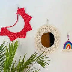A collection of my smaller, whimsical wall decor. This set includes a bright red crescent moon hanging, a small fringed mirror, and a mini rainbow charm, perfect for creating a happy little gallery wall.
