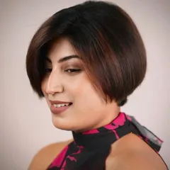 A profile view of the bob, demonstrating the expert graduation in the cut that allows the hair to fall perfectly into place.