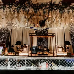 I designed this glamorous bar as the stunning centerpiece for a sangeet night. The intricate lattice work, overhead floral arrangements, and warm lighting created an unforgettable, high-end cocktail experience.