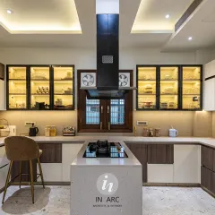 The kitchen is where memories are homemade. I designed this space to be a gathering place, balancing a modern modular layout with warm, inviting details like backlit cabinetry and an island for family and friends to gather around.