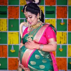 Celebrating a new chapter. This beautiful mom-to-be is glowing at her baby shower in one of our traditional gold-finish temple jewellery sets. Our collection isn't just for weddings; we love helping you find the perfect pieces for every milestone.