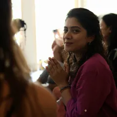 A candid moment of connection and gratitude during a kirtan session in Mysore. The joy of sharing this devotional practice with a community of seekers is a beautiful expression of oneness.