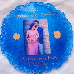 I love when clients choose bold colors. This vibrant blue resin platter was created to celebrate a new beginning, with the couple's names and special date captured in elegant gold lettering.