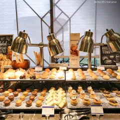 Indulge your sweet tooth at our pastry and dessert station. We offer a tempting array of freshly baked muffins, cakes, and other sweet treats.