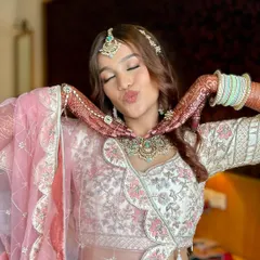 A fun and flawless look for the sister of the bride. Her makeup is glowing and radiant, with a focus on enhancing her beautiful smile and happy energy.