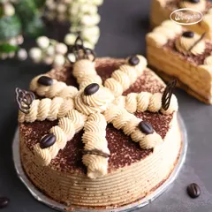 For those who love the aroma of a good brew, our Coffee Mocha Cake is the perfect treat. We infuse our light sponge with rich coffee flavour and top it with mocha cream swirls and whole coffee beans for an extra kick.