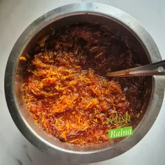 This is my Sundried Chhunda, a traditional Gujarati sweet pickle made with grated raw mango and sugar. I cook it slowly in the sunlight for about 10 days, a long process that results in a uniquely delicious, translucent, and syrupy pickle.
