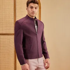 I believe in using color with intent. This combination of a structured maroon shacket with quilted details and muted pink trousers creates a look that is bold, balanced, and effortlessly modern.
