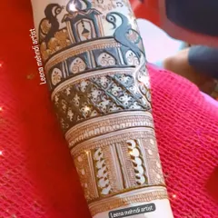 A heavy and festive design perfect for the Teej festival. The pattern features traditional architectural domes and peacocks, celebrating the spirit of the occasion.