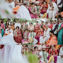 A triptych showing the couple and their families seated during the wedding ceremony, capturing the scale and importance of the gathering.