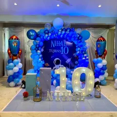 Blast off! An outer space theme for Nihal's 10th birthday, complete with rocket ships, planets, and a stunning balloon arch. I love creating these immersive worlds for kids to celebrate in.