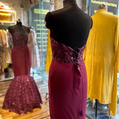 A view of the back of the custom corset bodice ball gown. The lace-up detail not only adds a touch of classic glamour but also ensures the gown is tailored to a perfect, comfortable fit.