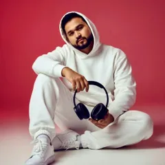 A professional portrait from a recent photoshoot. As an artist, I believe in presenting a strong and professional brand image that reflects the quality of my music.
