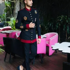 Styling singer Arjun Kanungo was about creating a look that matched his dynamic stage presence. This custom-embellished bandhgala jacket offers a modern take on royal Indian menswear, perfect for performances and high-profile events.
