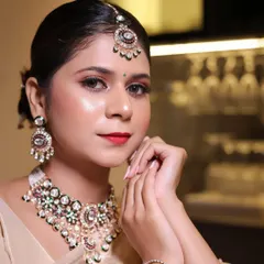 See how our jewellery brings a look to life. This is one of my premium moissanite and meenakari sets, perfect for a bride or for attending a wedding. Renting allows you to wear such an exquisite, complete set with choker, earrings, and maang tikka without the huge expense.