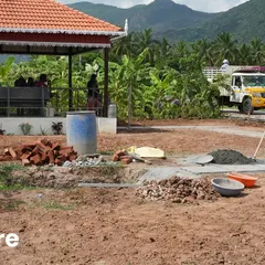 Before: A rural property with raw, undeveloped land and a newly constructed gazebo. The potential is there, but it lacks connection and life.