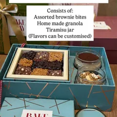 The Perfect Combo Hamper menu. This hamper includes assorted brownie bites, homemade granola, and a Tiramisu jar with customizable flavors.