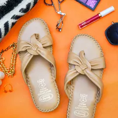 A vibrant and energetic flatlay for a footwear brand. Using a bold background and relevant props like makeup and accessories, this image tells a story about the customer's lifestyle, making it highly effective for Instagram marketing.