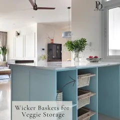 Wicker baskets are a stylish and practical solution for storing vegetables like onions and potatoes. Integrated into this kitchen island, they provide necessary air circulation and add a warm, earthy touch.