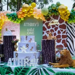 We took the party outdoors with this "Wild One" jungle-themed birthday. The setup includes lush greenery, animal print backdrops, and character cutouts, all designed to create an immersive safari adventure for the little one and their guests.