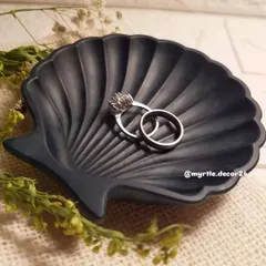 Our bestselling mini shell dish in a classic navy blue. This elegant color makes it a sophisticated catch-all for rings and other small treasures.