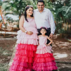 Create precious memories with our mom-and-daughter twinning sets. This fun, multi-layered pink and red tulle gown combination is perfect for celebrating a new arrival with the whole family.