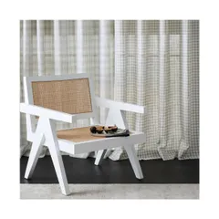 The 'Apollo' collection of patterned sheers is perfect for creating a relaxed and tranquil Hamptons aesthetic. The subtle check pattern adds a touch of classic, coastal charm to this bright space.