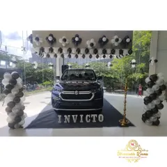 For the launch of the Maruti Suzuki Invicto at a Nexa showroom, I designed a sleek and modern black and white theme. The decor, including balloon pillars and wall arrangements, was created to highlight the new car without distracting from it.