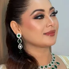 A close-up of Razia's elegant Nikkah look. I created defined kohl eyes and radiant, dewy skin, finished with a natural lip and soft blush for a graceful style.