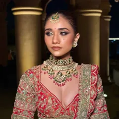 A side profile showcasing the sharp, defined contour and the intricate details of the eye makeup. This angle highlights how the look is structured to be beautiful from every perspective.