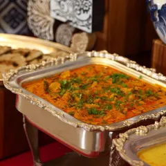 A rich and flavourful Gatte ki Sabji, presented in an elegant silver serving dish. This classic gram flour curry is a testament to our commitment to authentic regional Indian flavours.