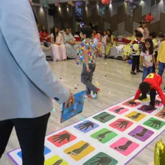 Getting everyone tangled up in fun with a classic party game! I bring a variety of interactive games like this floor mat challenge to keep the energy high and the kids laughing at every birthday party.