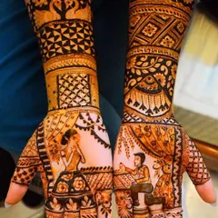 I love bringing wedding rituals to life, like this ring ceremony scene captured in henna. This custom portrait mehndi shows the groom placing the ring on the bride's finger, making it a truly personal and memorable design for her special day.