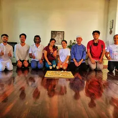 A group of participants after completing a Surya Kriya workshop. It is a joy to guide others through this ancient practice and witness the sense of peace and balance it brings.