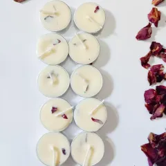 Two neat rows of my rose petal tealights, showing the unique distribution of petals in each handcrafted candle. No two are exactly alike.
