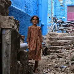 In the blue lanes of Jodhpur, I saw this young girl standing with a curious gaze. This shot is about more than just a portrait; it's about capturing a person within their environment, telling the story of a place through its people.