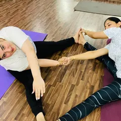 Another view of our partner stretches. Working with a partner allows you to use gentle resistance to increase your range of motion safely.