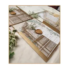 An enchanted fairytale wedding comes to life with this intricate laser-cut gatefold design. Finished with a custom wax seal, this physical invitation offers a tangible sense of magic and anticipation for the special day.