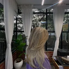 The same colour correction, viewed from a different angle. The hair now looks healthy, vibrant, and the colour is perfectly balanced.