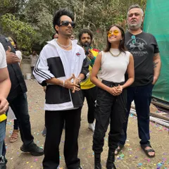 A candid shot of artists Tony Kakkar and Yohani backstage at the Holi event. My event coverage often includes capturing these behind-the-scenes moments.