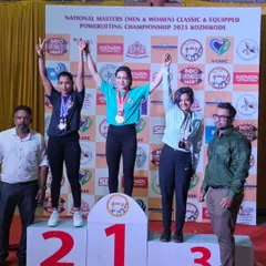 Results are the only metric that matters. Here is my client Renu on the podium, securing a bronze medal at her first National Powerlifting Meet after hitting personal bests on her squat and deadlift. This is the outcome of consistent, structured strength training.